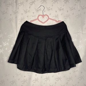 black pleated skirt